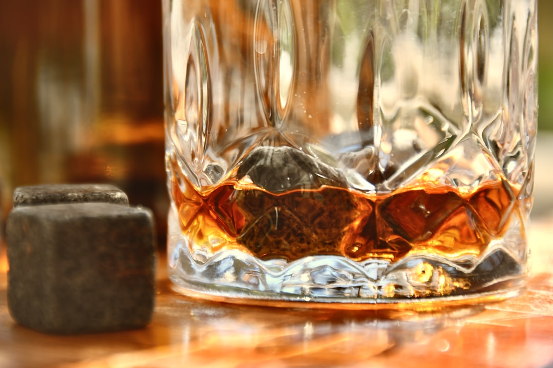 scotch whisky vs bourbon comparison glass bar aesthetic 2026