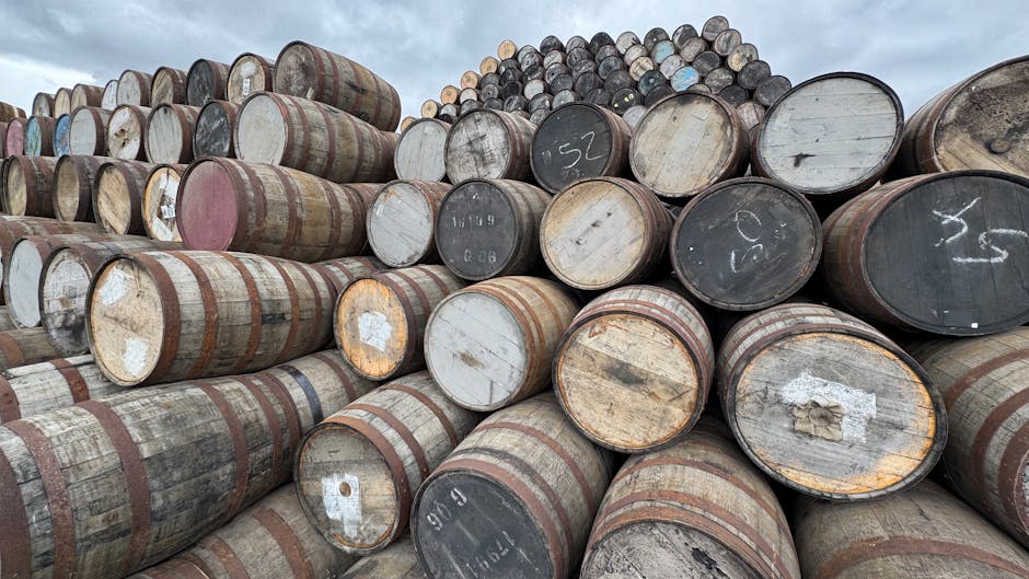 single malt whisky bottles aged oak barrel Scottish distillery 2026