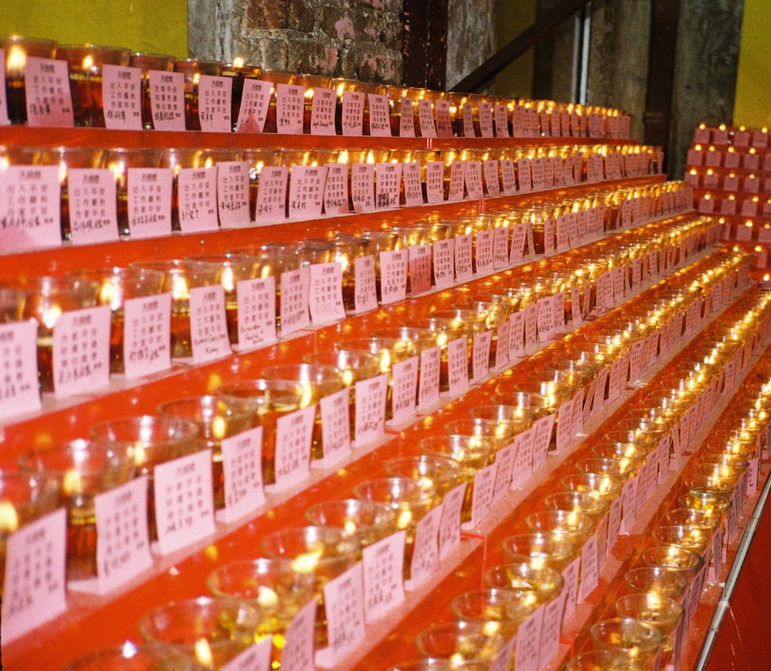 tequila bottles lineup blanco reposado anejo aging barrels distillery