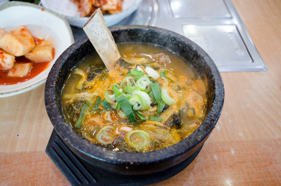Korean makgeolli bowl with pajeon savory pancake rainy day traditional Korean setting