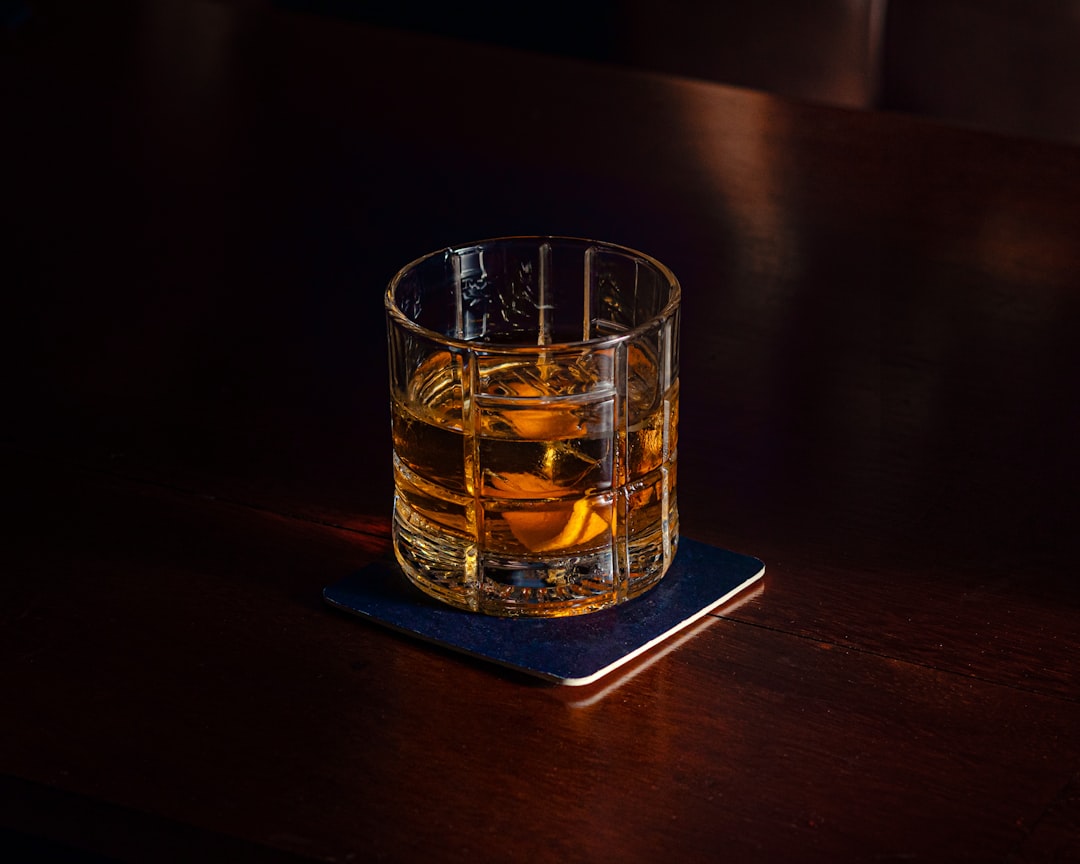 Irish whiskey glass vs Scotch whisky glass side by side comparison bar setting