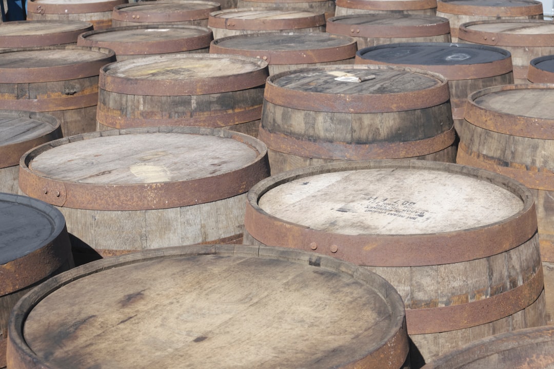 whisky barrels aging in Irish distillery warehouse oak casks