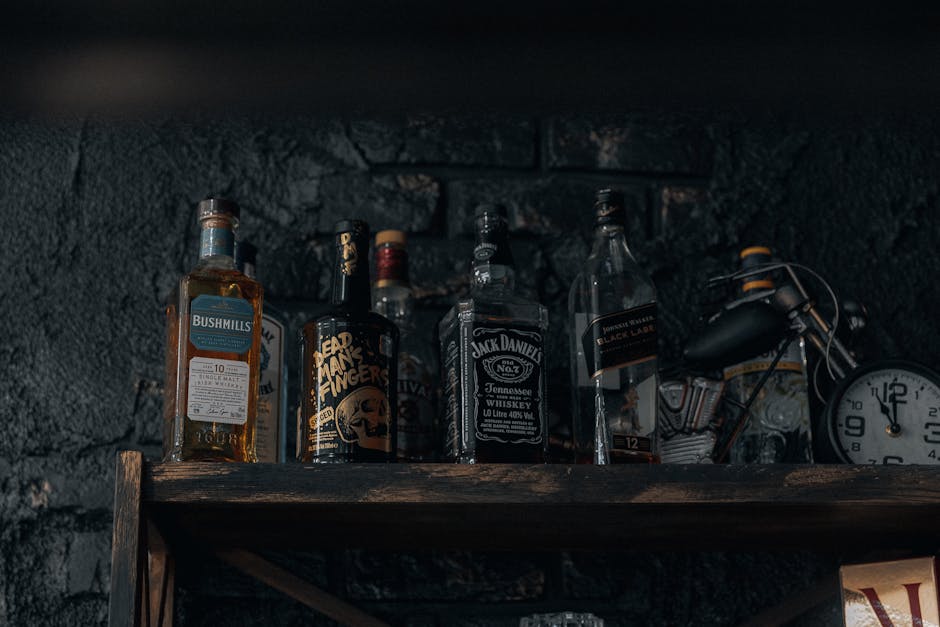 bourbon whiskey bottles shelf amber liquid bar