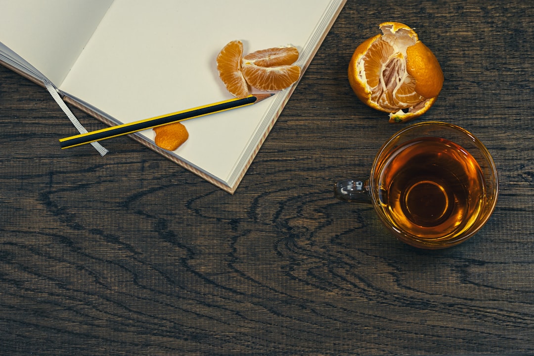 whisky tasting glass amber color wooden table cozy atmosphere
