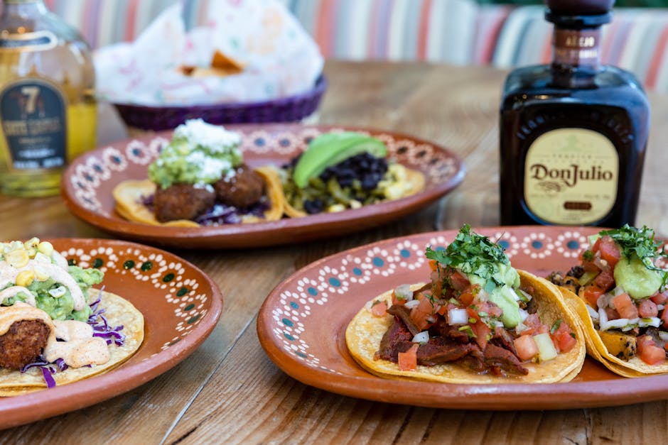 Mexican food spread tacos ceviche mezcal tequila pairing dinner table
