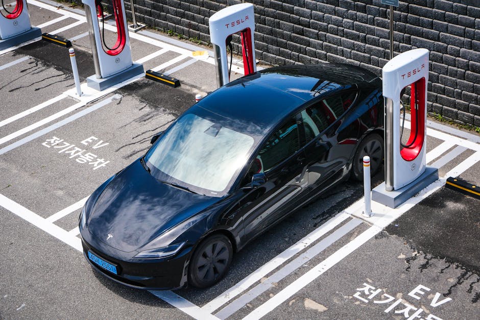 Tesla Model Y white exterior, electric vehicle charging station Korea