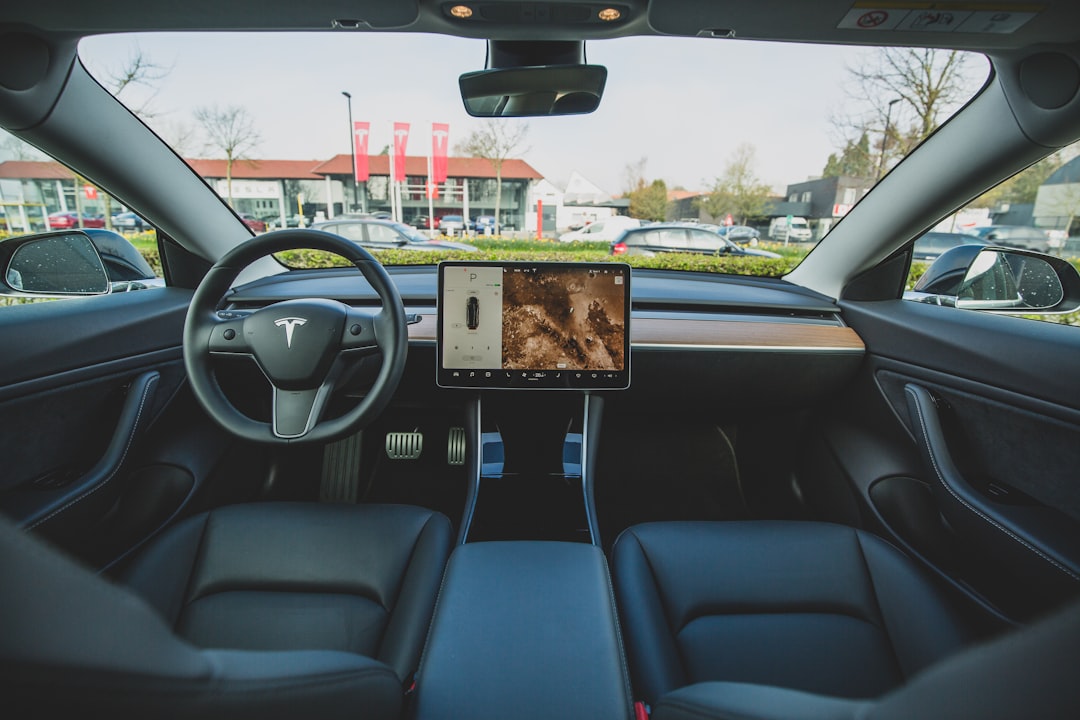 Tesla Model Y interior dashboard minimalist, Tesla charging winter cold weather range