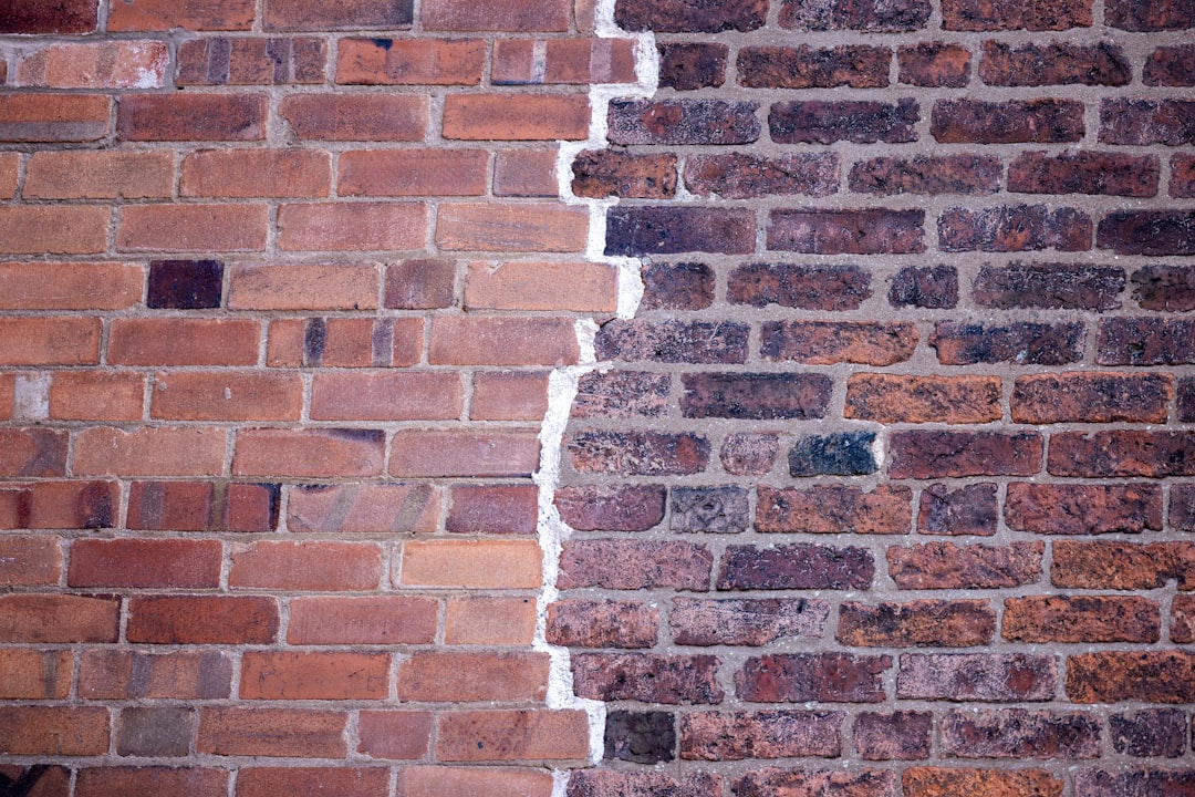 brick mortar joint tuck pointing close-up, deteriorated mortar before after