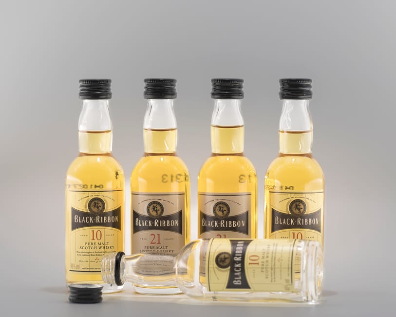 Glenmorangie Original 10 year bottle, highland scotch whisky amber color